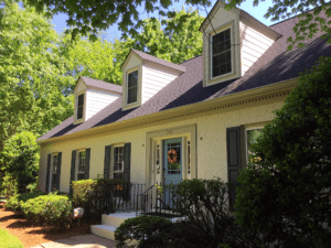 Side view of a house in yellow and purple color